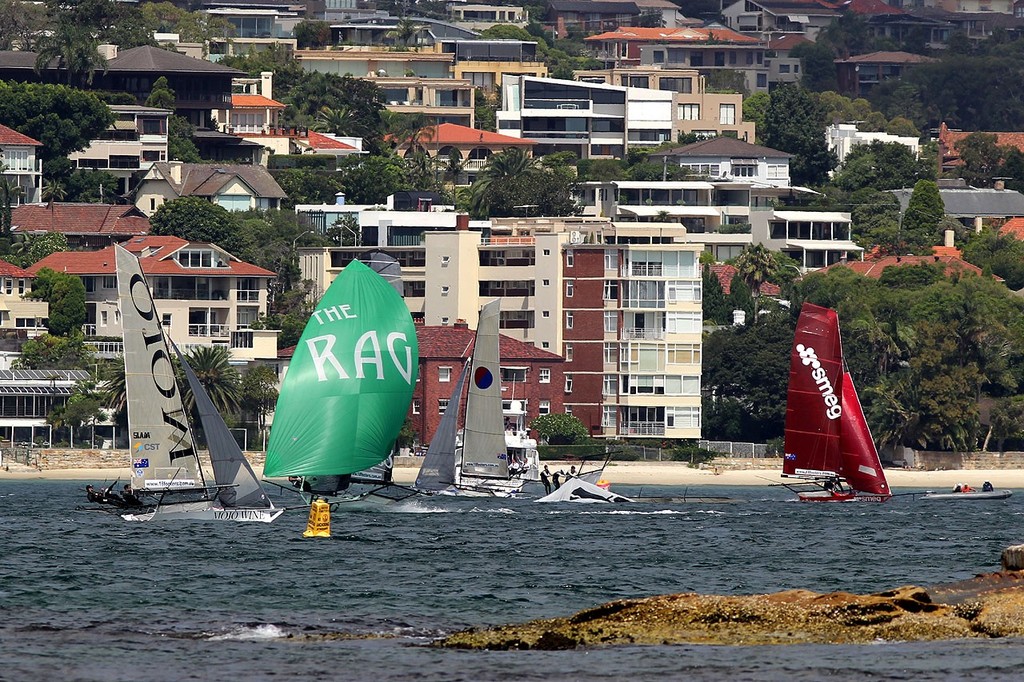 Thurlow Fisher’s day is over as the Rag sails away - JJ Giltinan 18ft Skiff Championship 2013, Race 5 © Frank Quealey /Australian 18 Footers League http://www.18footers.com.au